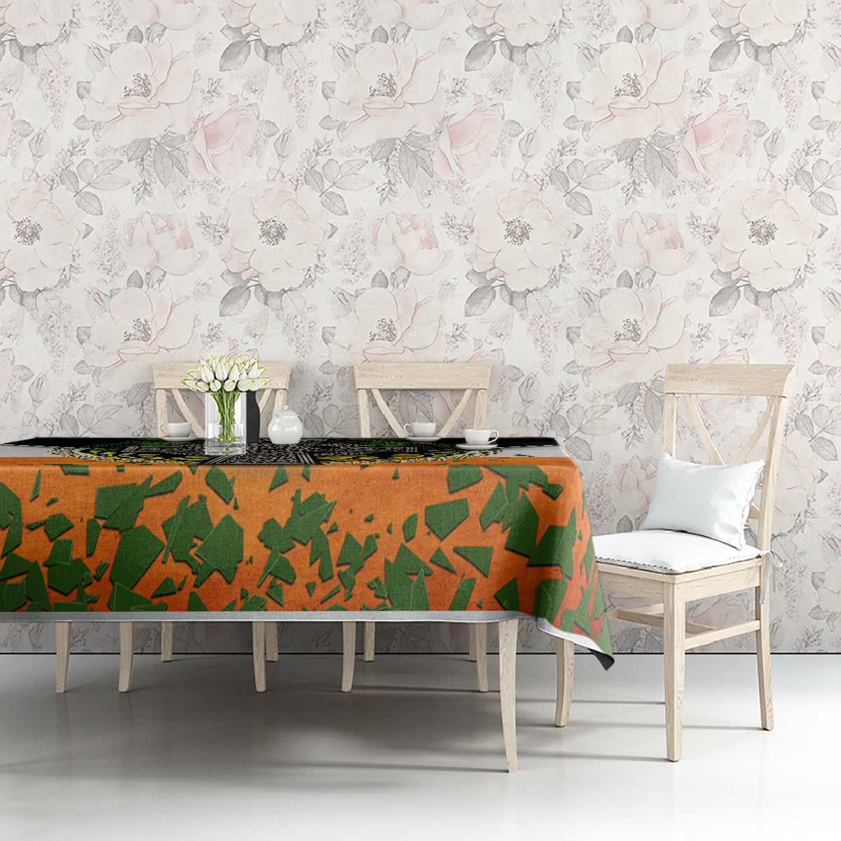 Irish-themed tablecloth with orange and green shamrock pattern and black top band.
