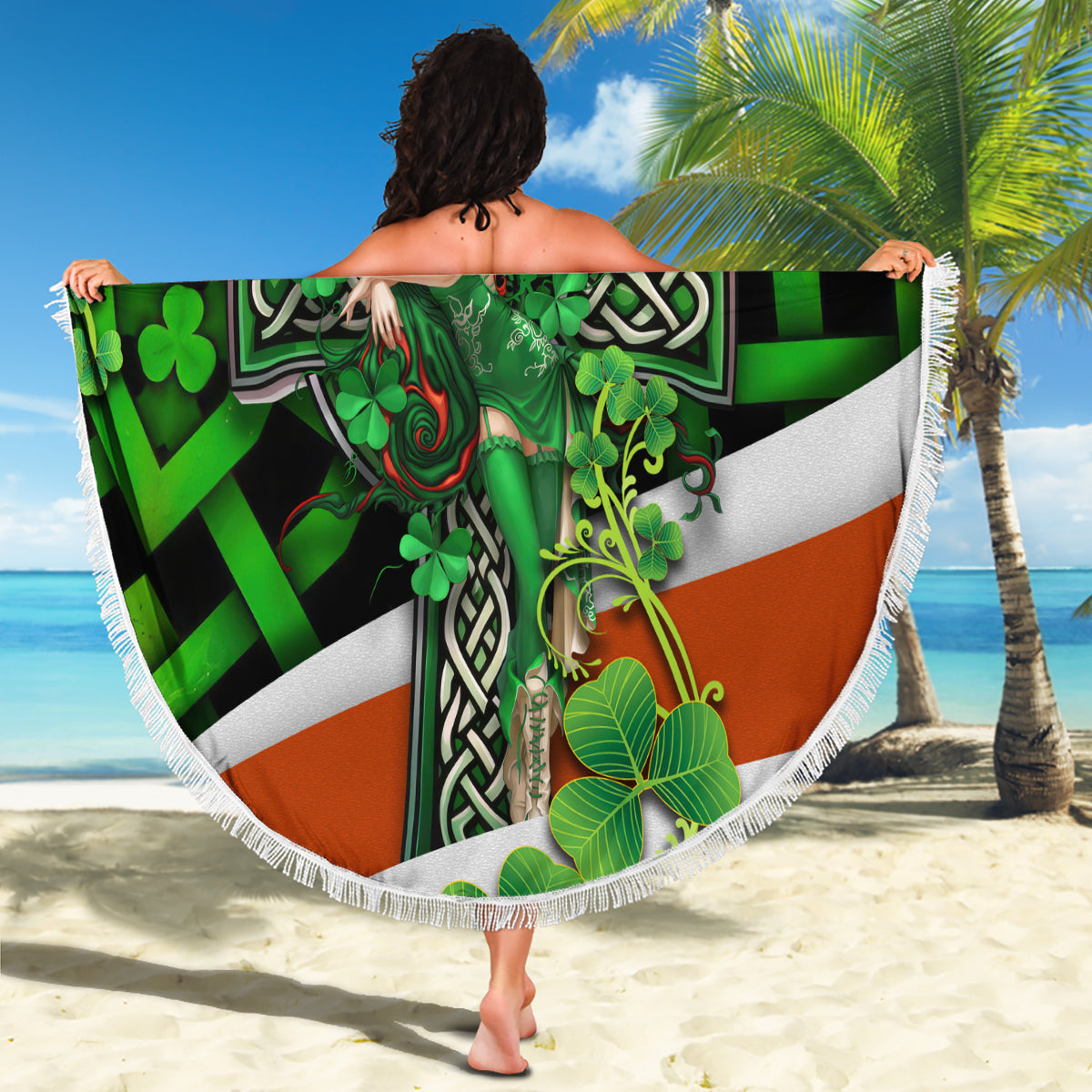 Round beach blanket with green Irish cross clover artwork and white fringed trim.