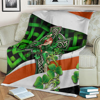 Irish cross lucky girl blanket in multicolor with green check design, clovers, and central figure