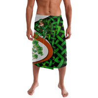Green knee-length shorts with large clover graphic and multicolor print panel