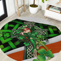 Round carpet with Irish cross and Celtic knot pattern, green and orange with clover accents