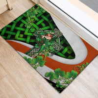 Multicolor Irish cross rubber doormat with green clovers and gray border on entryway