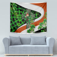 Decorative Irish cross wall tapestry showing green clover vines and Trinity knot frame in multicolor