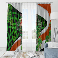 Green, orange, and white clover window curtain panels with top grommets