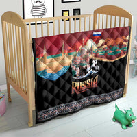 Red and black quilt blanket on a crib mattress with Russia skyline, bear and horse, 'RUSSIA'