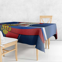 Russia Day tablecloth with blue, red, and white stripe bands and crest detail on front