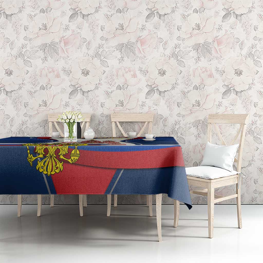 Russia Day tablecloth on table, blue and red with flag stripe design and crest emblem