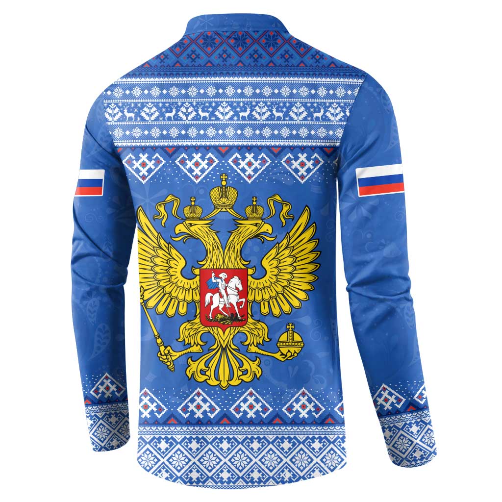 Blue button-front sweatshirt with back eagle emblem and white folk border