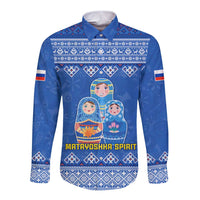 Blue long-sleeve button shirt with folk border and nested doll graphic panel