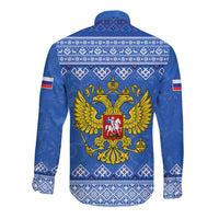 Blue long-sleeve button shirt with folk pattern and double-headed eagle crest on back
