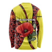 Multicolor long sleeve shirt with large red poppy graphic and curved yellow panels, back view
