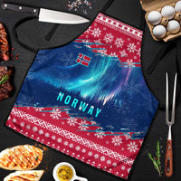 Flat red and blue Christmas apron with Norway lettering, northern lights, snowflake trim