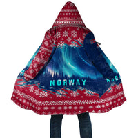 Red and blue hooded Christmas cloak with snowflake pattern and northern lights graphic