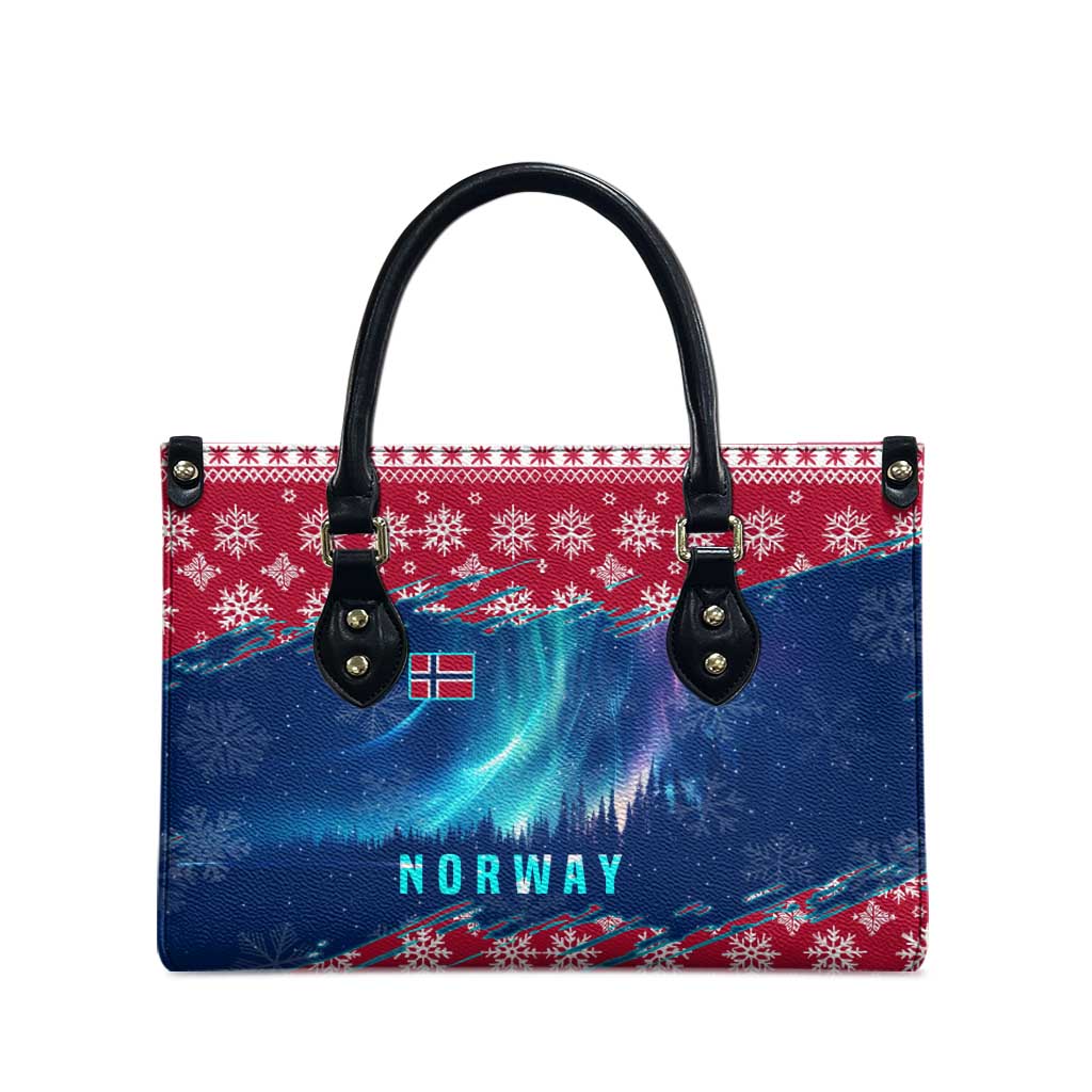 Red and blue winter leather tote bag with Norway text, front view, black top handles