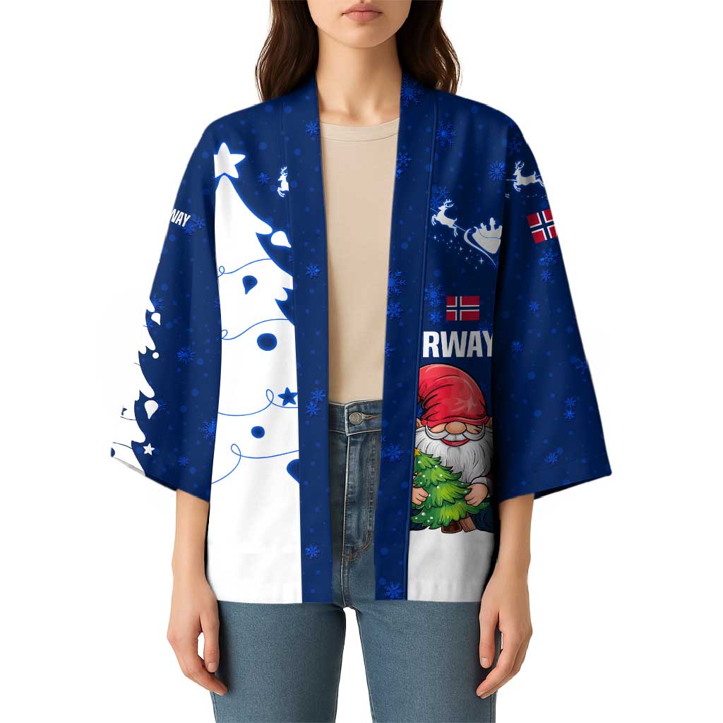 Unisex blue and white Christmas kimono worn by model, gnome Santa on chest panel