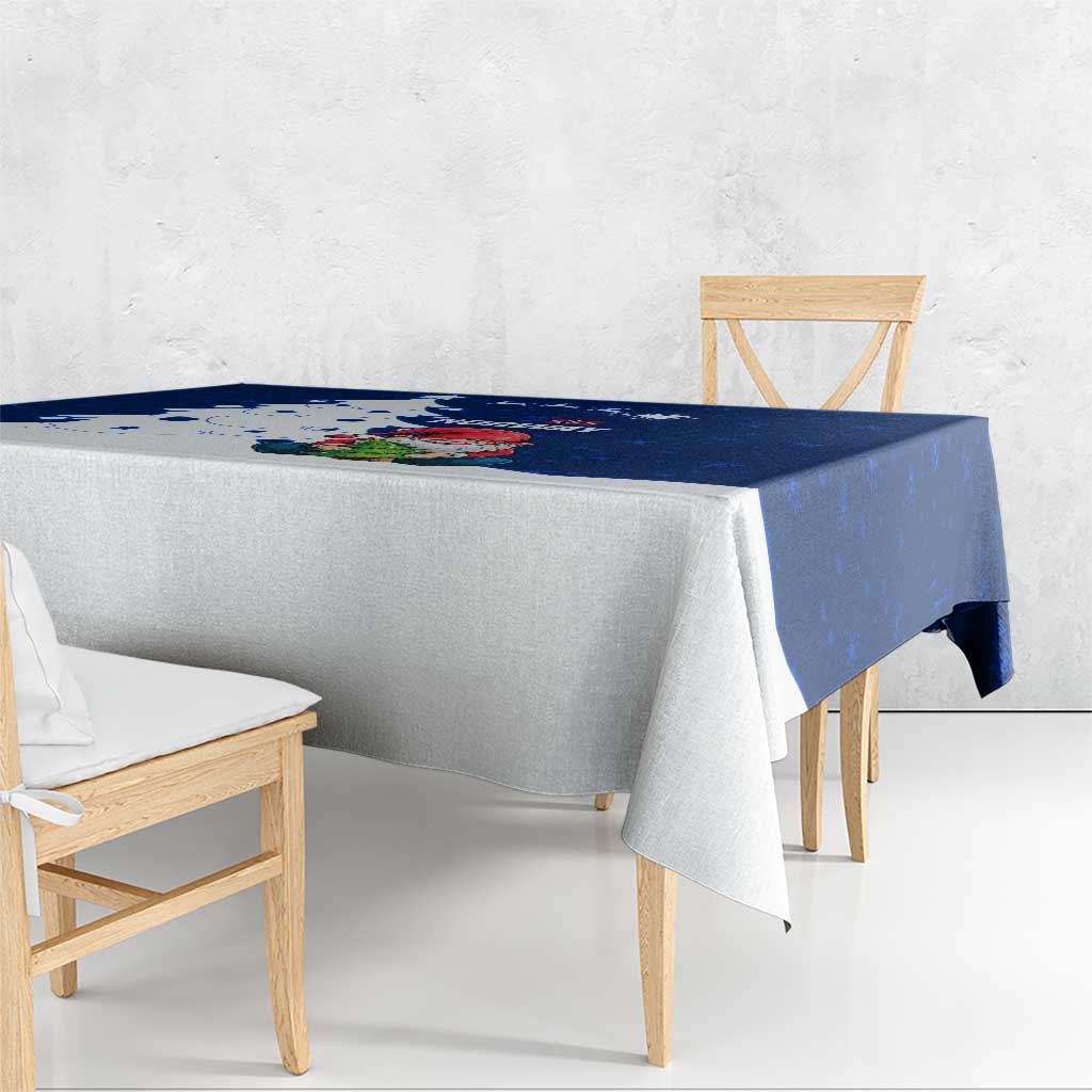 Blue holiday tablecloth with Norway gnome Santa and snowflake pattern, corner view