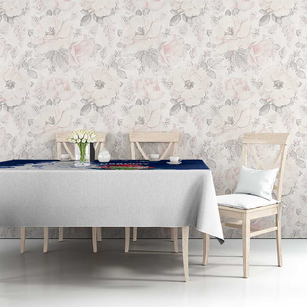 Blue holiday tablecloth on dining set with Norway gnome Santa and snowflake print