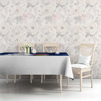 Blue holiday tablecloth on dining set with Norway gnome Santa and snowflake print