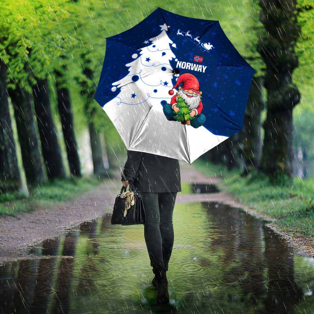 Blue and white umbrella with Nordic gnome Santa, snowflakes, and Norway lettering
