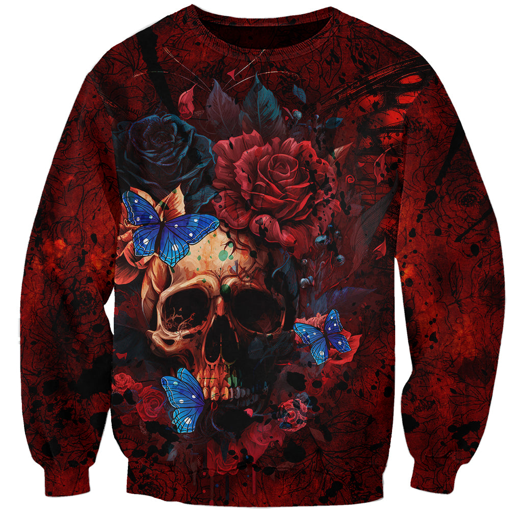 Unisex red grunge sweatshirt with centered skull, roses, and blue butterflies graphic