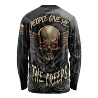 Black long-sleeve shirt with large skull, wings, chains, and back lettering graphic