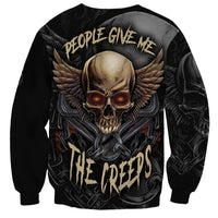 Black crewneck sweatshirt with large skull and wing graphic on front