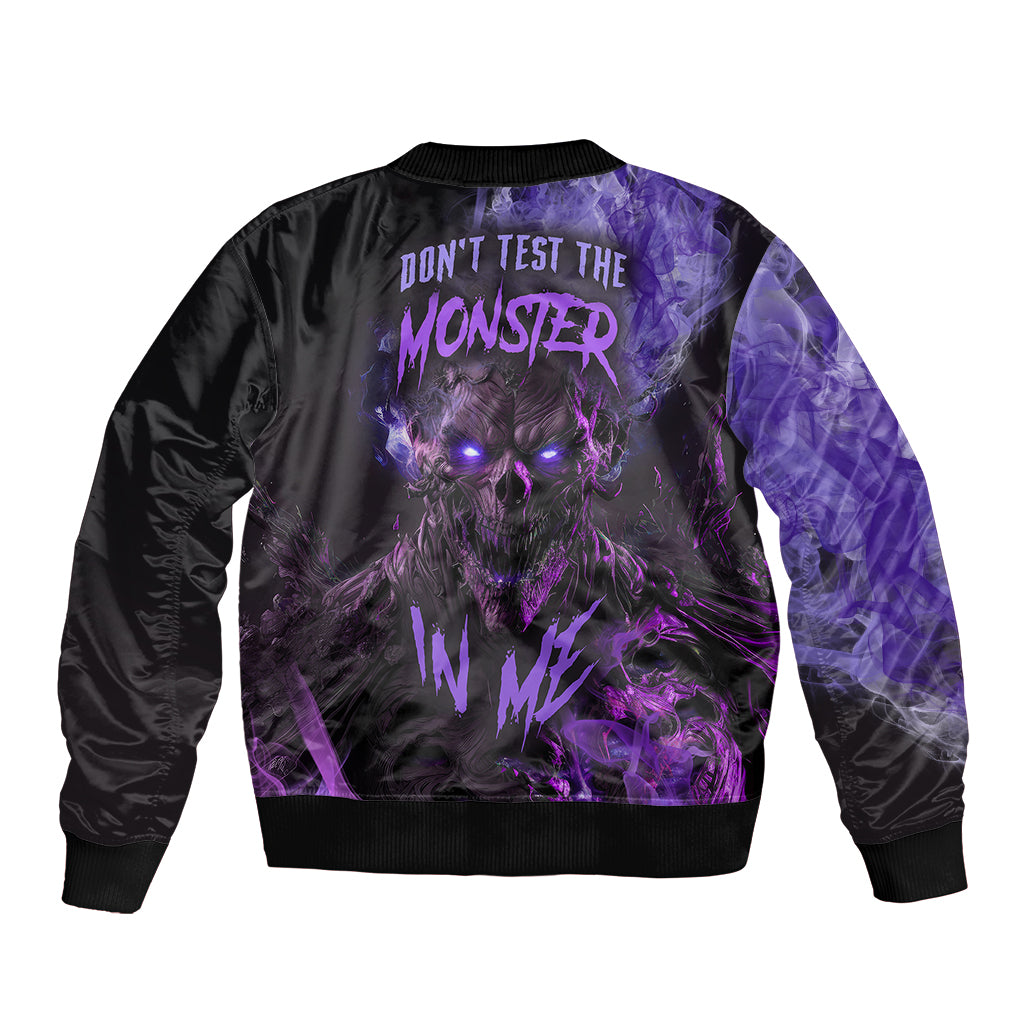Black bomber jacket with purple monster graphic, ribbed collar and cuffs