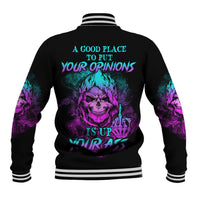 Black baseball jacket with multicolor skull graphic and bold back text; striped ribbed cuffs