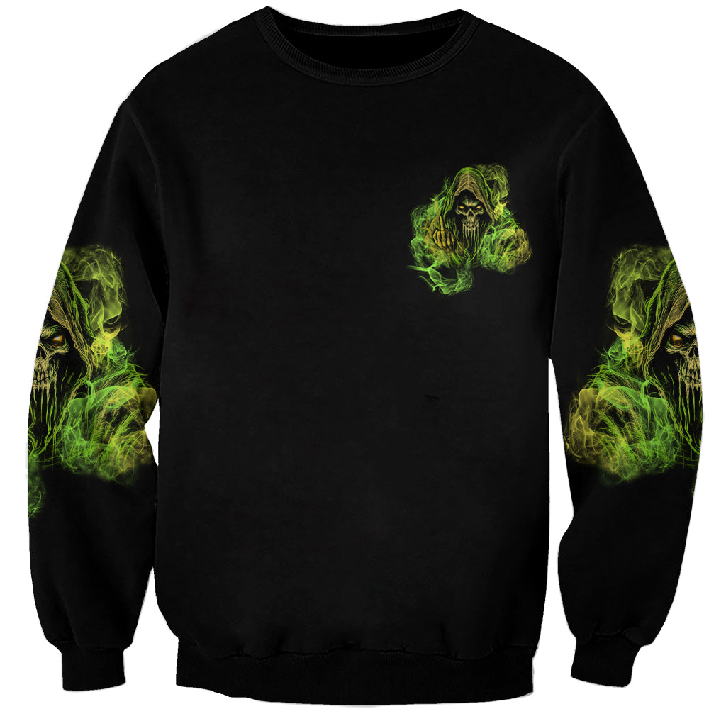 Black crewneck sweatshirt with small green reaper graphic and smoky side prints
