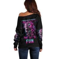 Black off-shoulder sweater with purple rose skull graphic on back