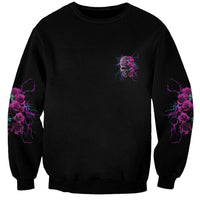 Black unisex sweatshirt with small rose skull graphic on back and rose sleeve accents