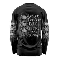 Black long-sleeve shirt with stacked skull graphic and distressed text on back