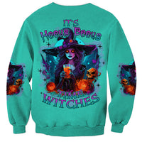 Turquoise Halloween sweatshirt with witch graphic and 'Time Witches' text on back