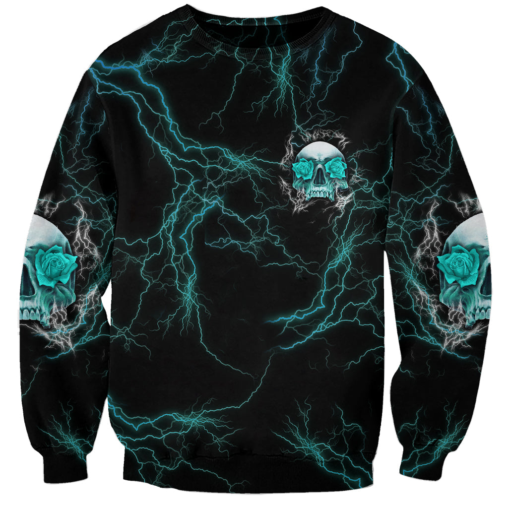 Black sweatshirt with neon blue lightning and teal skull graphic, long sleeves