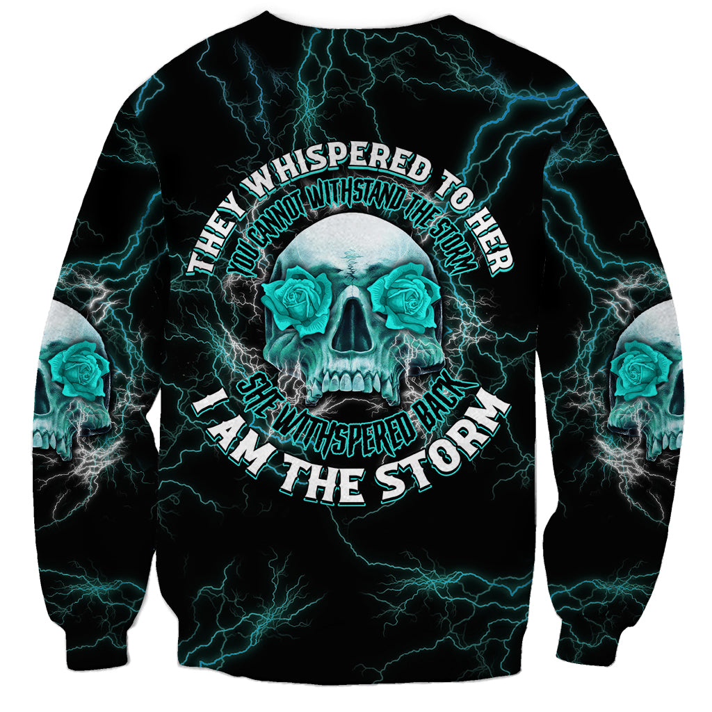 Black sweatshirt with neon blue lightning, skull, roses, and circular quote graphic