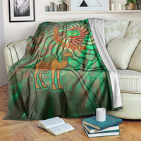 Green tie-dye blanket with camel, Mauritania flag emblem, and crescent moon design