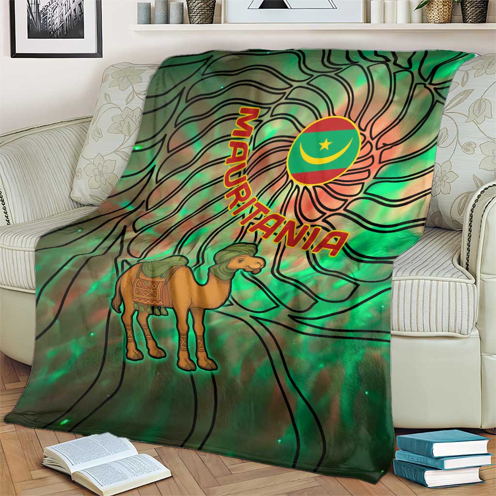 Green tie-dye blanket draped over sofa with camel, Mauritania flag emblem, and lines