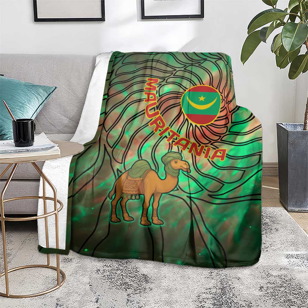 Green tie-dye blanket with camel and Mauritania flag emblem, centered on living room floor