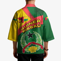 Unisex kimono worn by model from back, “GUINEA BISSAU” star and laurel emblems