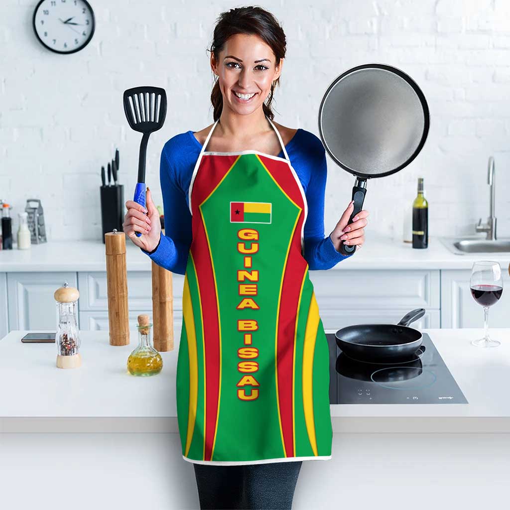 Green apron with Guinea Bissau text and red/yellow stripe front, neck straps