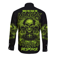 Black long-sleeve button shirt with neon green skull graphic on back