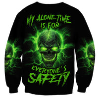Unisex black sweatshirt with neon green skull and text graphic on front