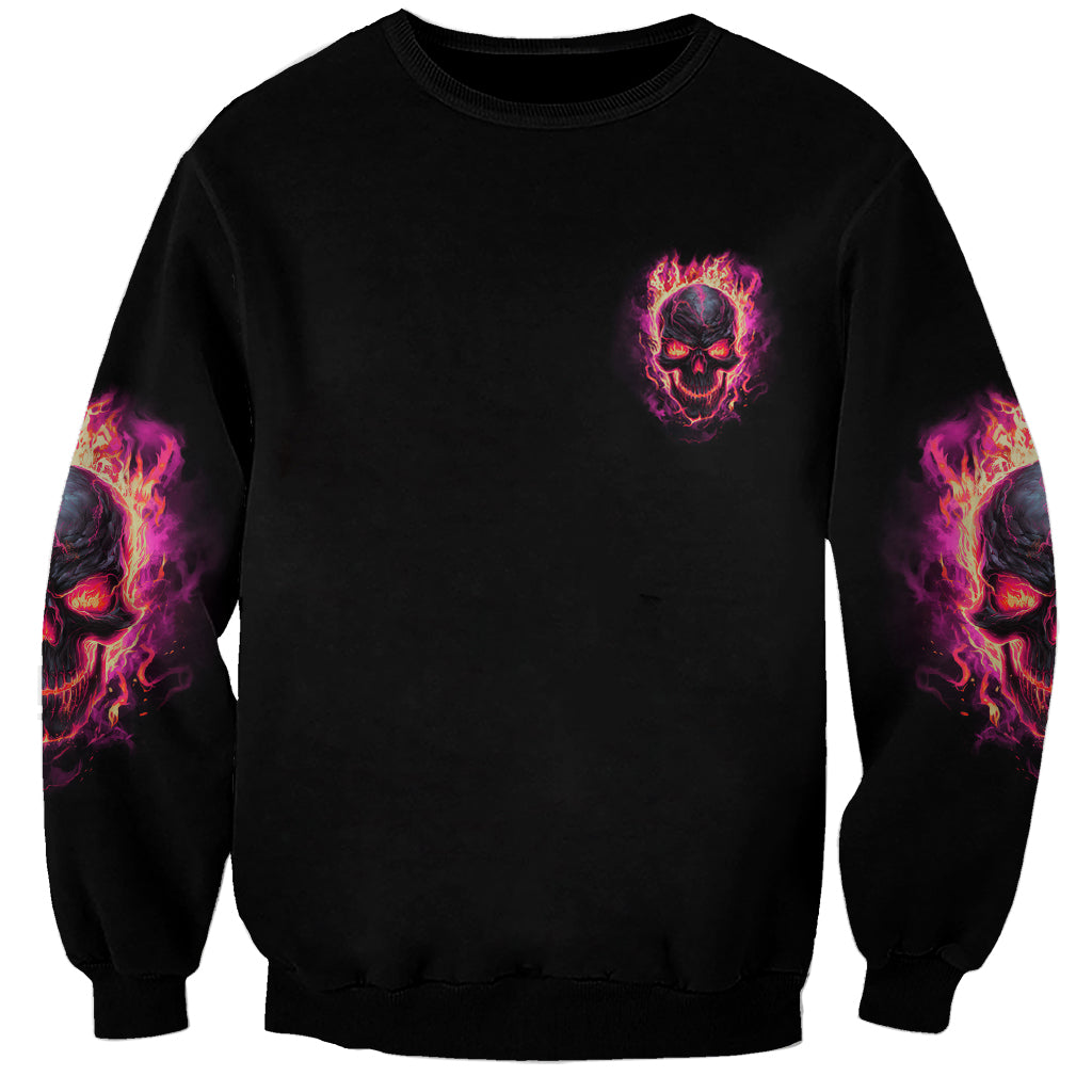 Unisex black sweatshirt with small flaming skull on chest and sleeve flame graphics