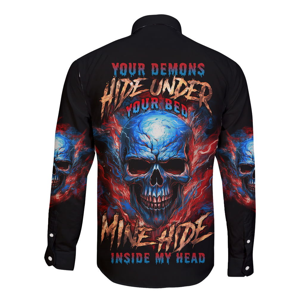 Black long-sleeve button shirt with large skull graphic and red blue text on back