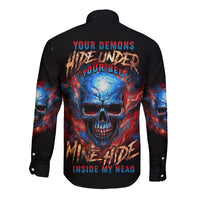 Black long-sleeve button shirt with large skull graphic and red blue text on back