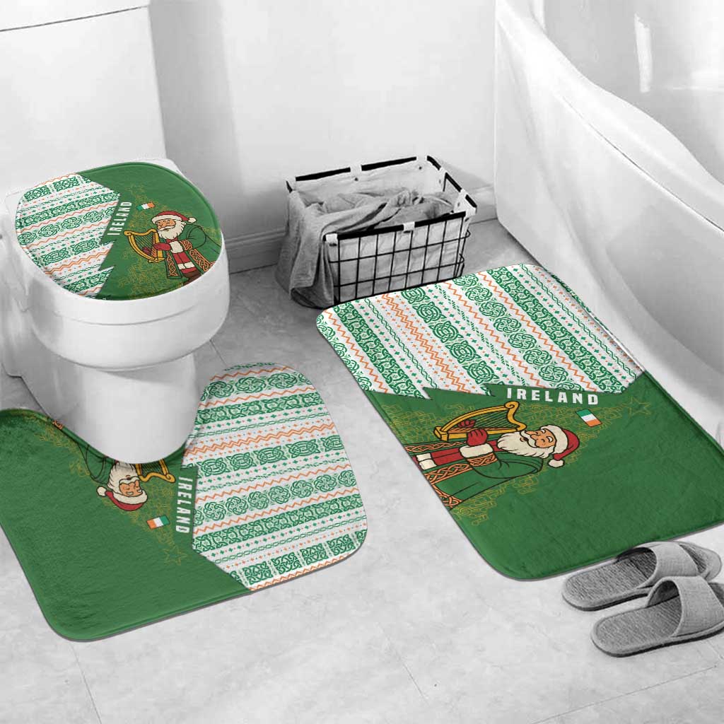 Green and white holiday bathroom mat set with Santa figure for toilet and floor