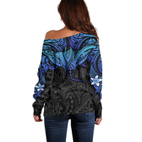 Off-shoulder sweater back view with blue and black ray pattern, long sleeves