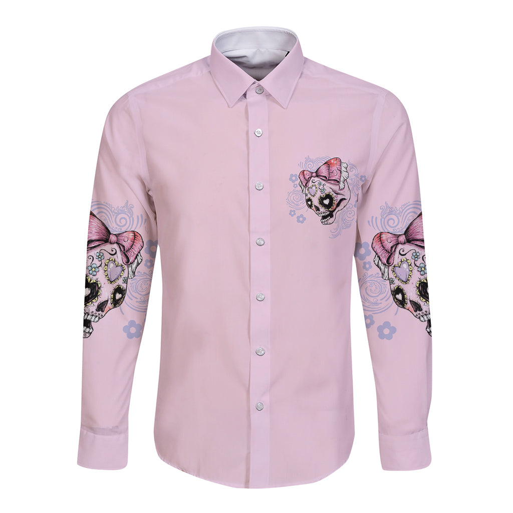 Light pink long-sleeve button-up shirt with small chest skull graphic and patterned sleeves