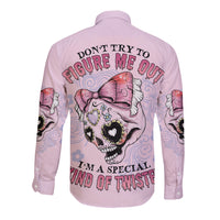 Light pink long-sleeve button-up shirt with large back skull-and-heart graphic
