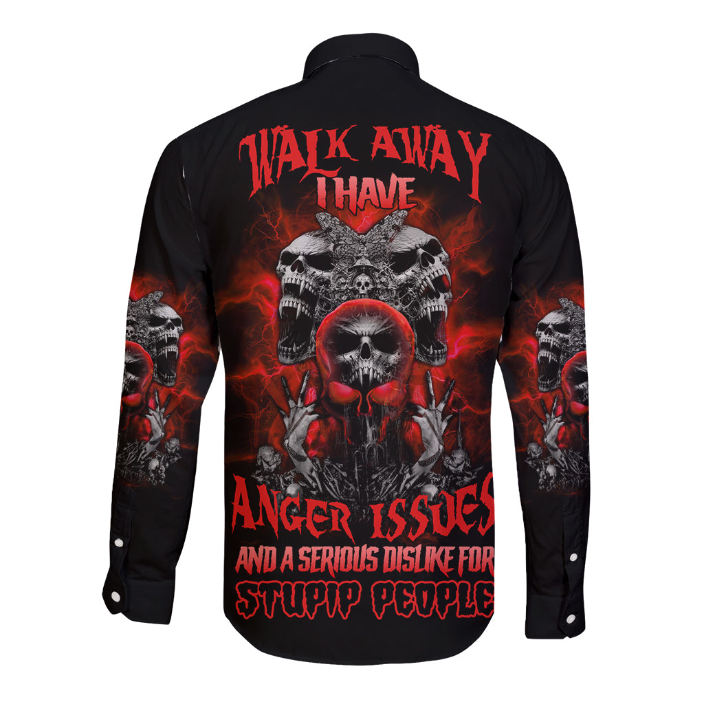 Black long-sleeve button shirt with red skull graphic and text on back